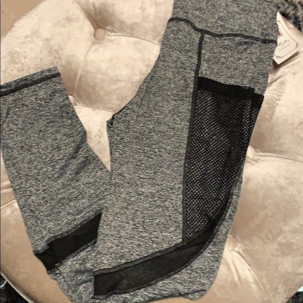 Lightweight gray and black leggings, mesh pockets